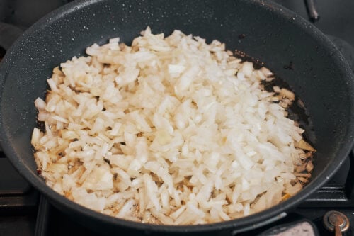 chopped onions cooking in skillet