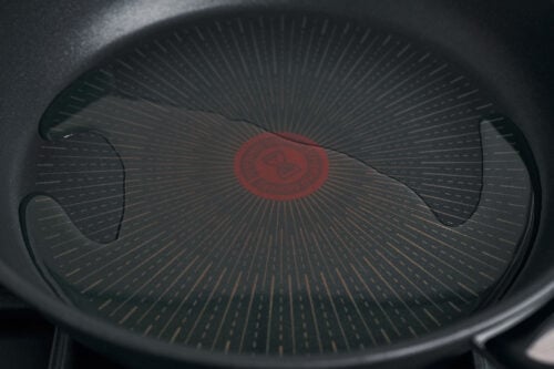 oil heating in skillet over medium high heat