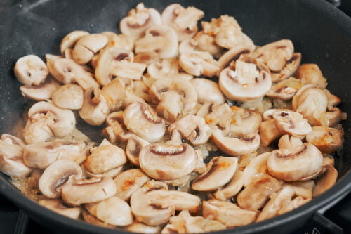 mushrooms starting to cook and release their moisture