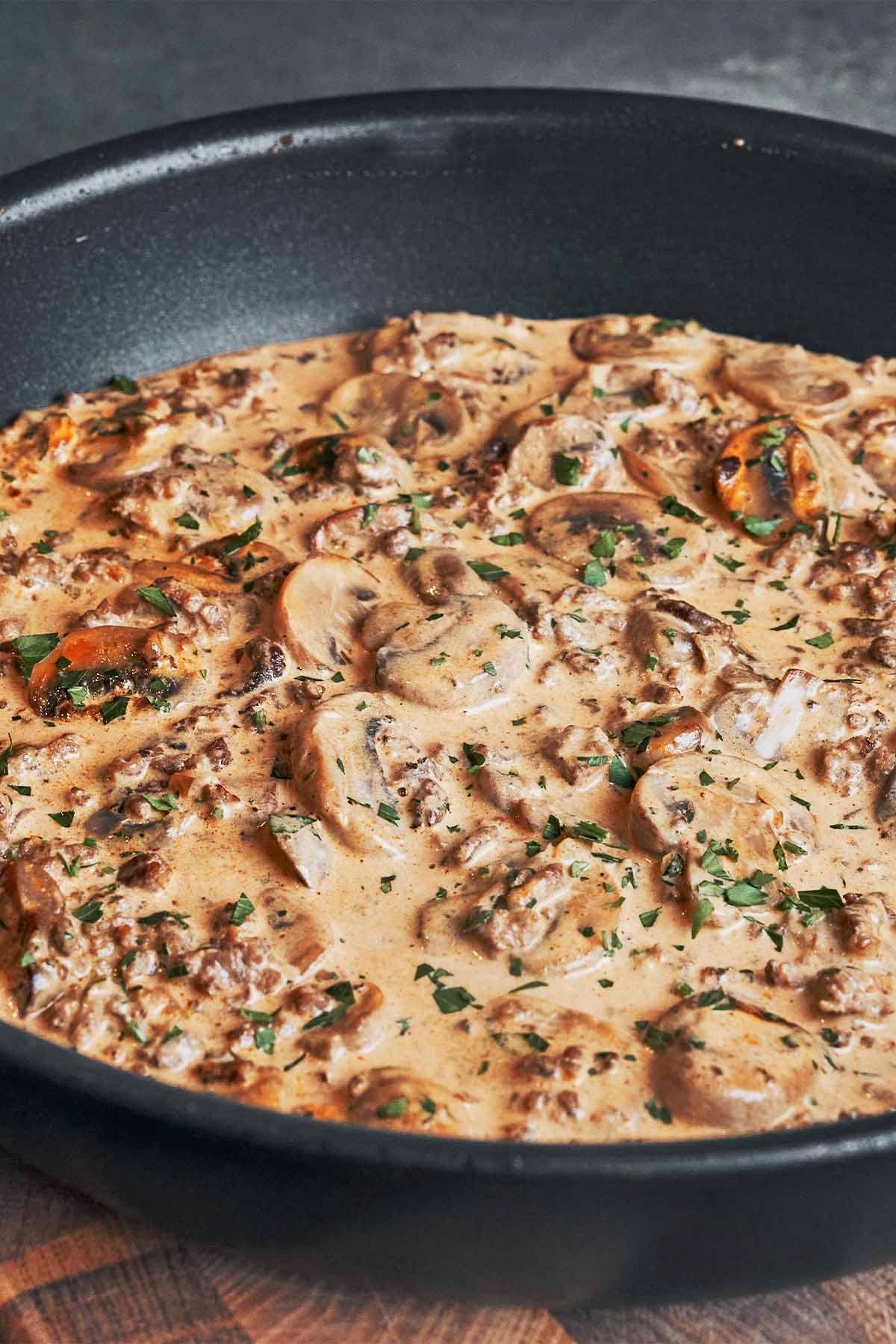 creamy ground beef stroganoff served over rice with mushrooms