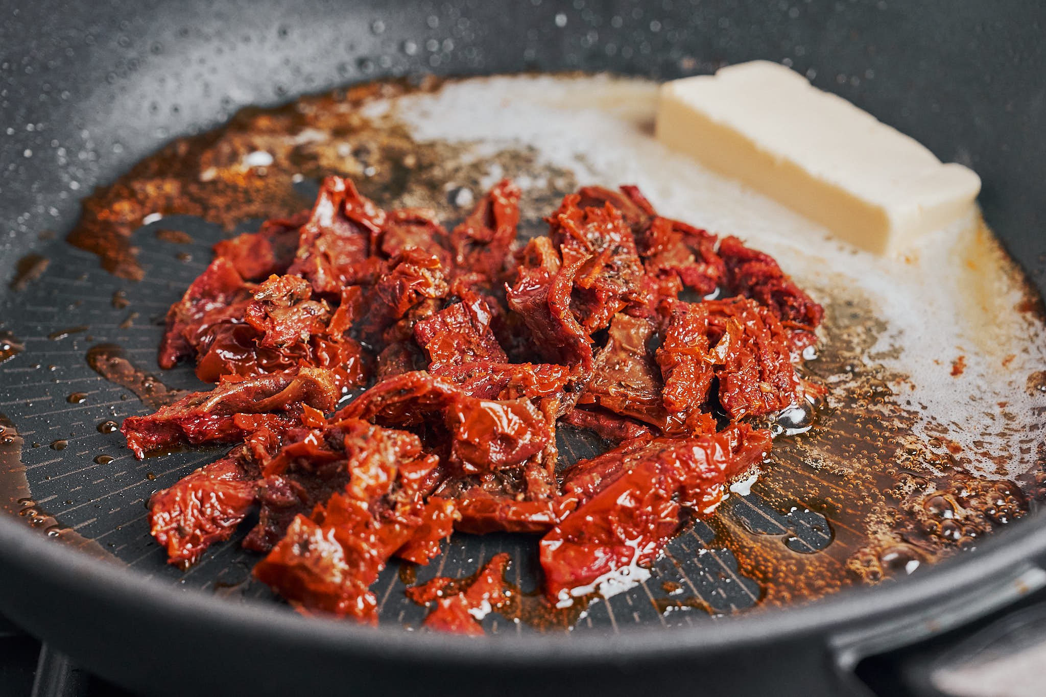 sun dried tomatoes added to the skillet with butter for the sauce base