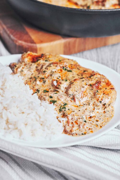 creamy sun dried tomato chicken served over fluffy white rice