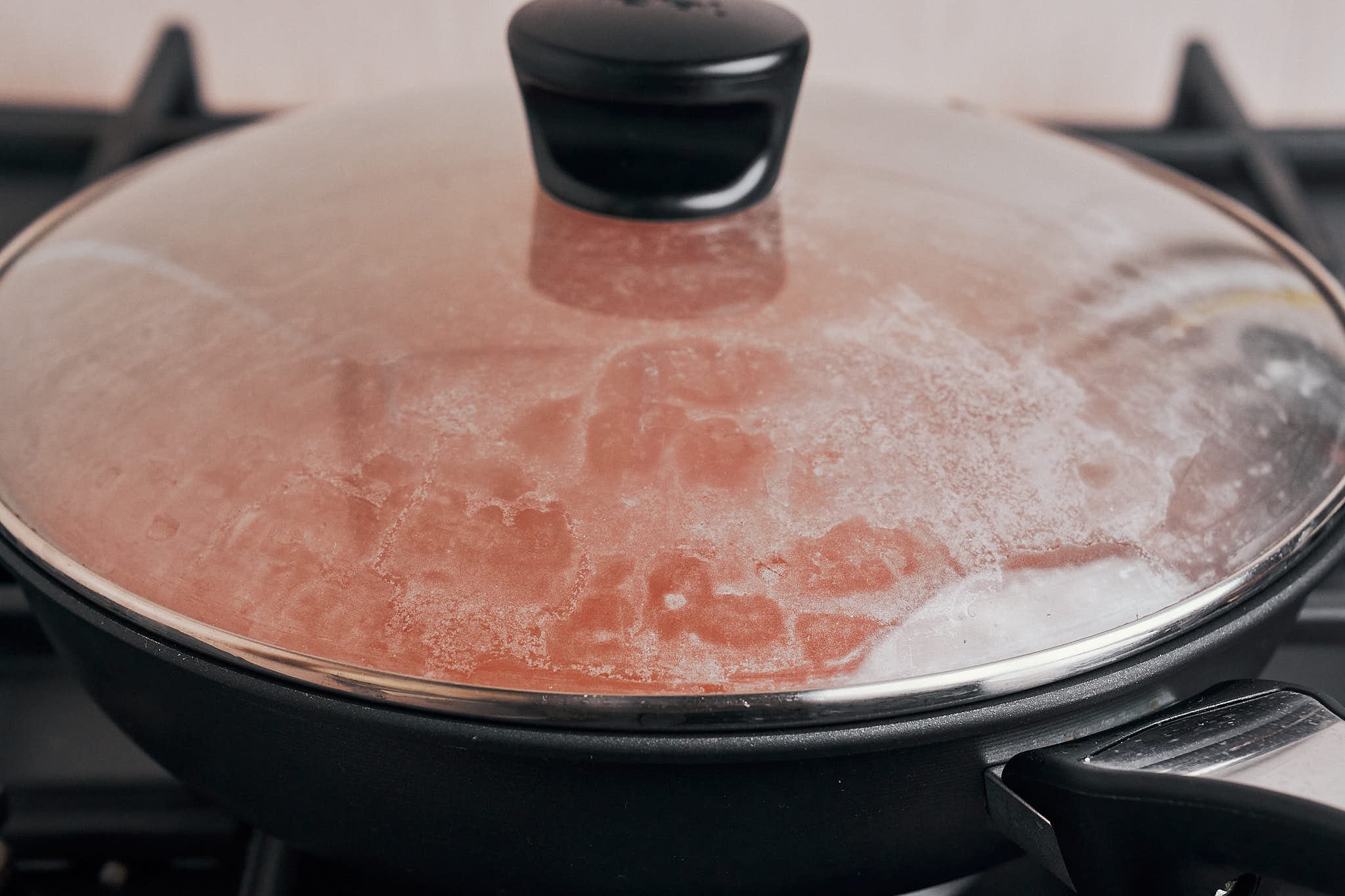 the skillet covered so the rice can gently simmer until tender