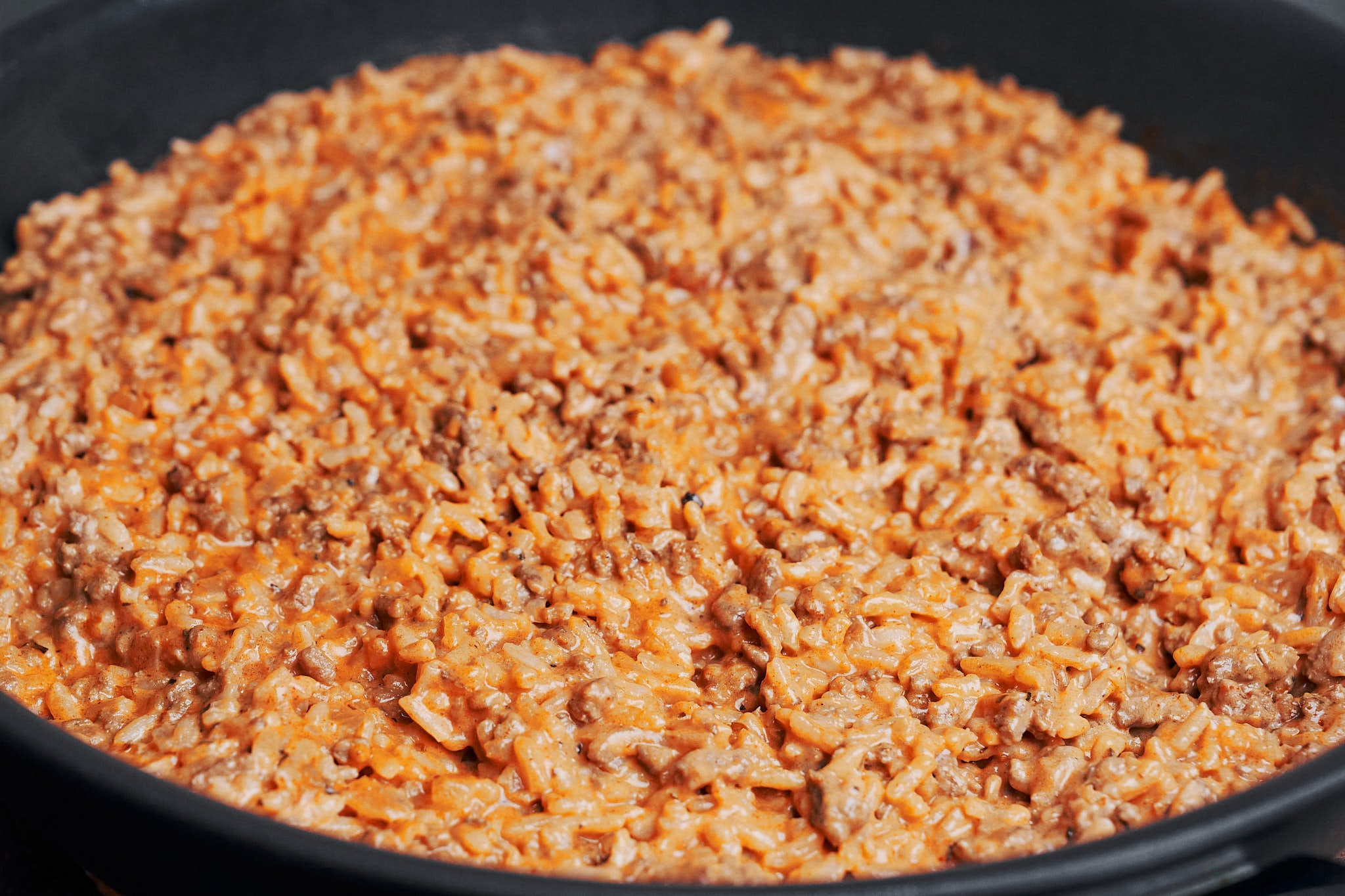 the skillet stirred together into a creamy tomato beef and rice mixture