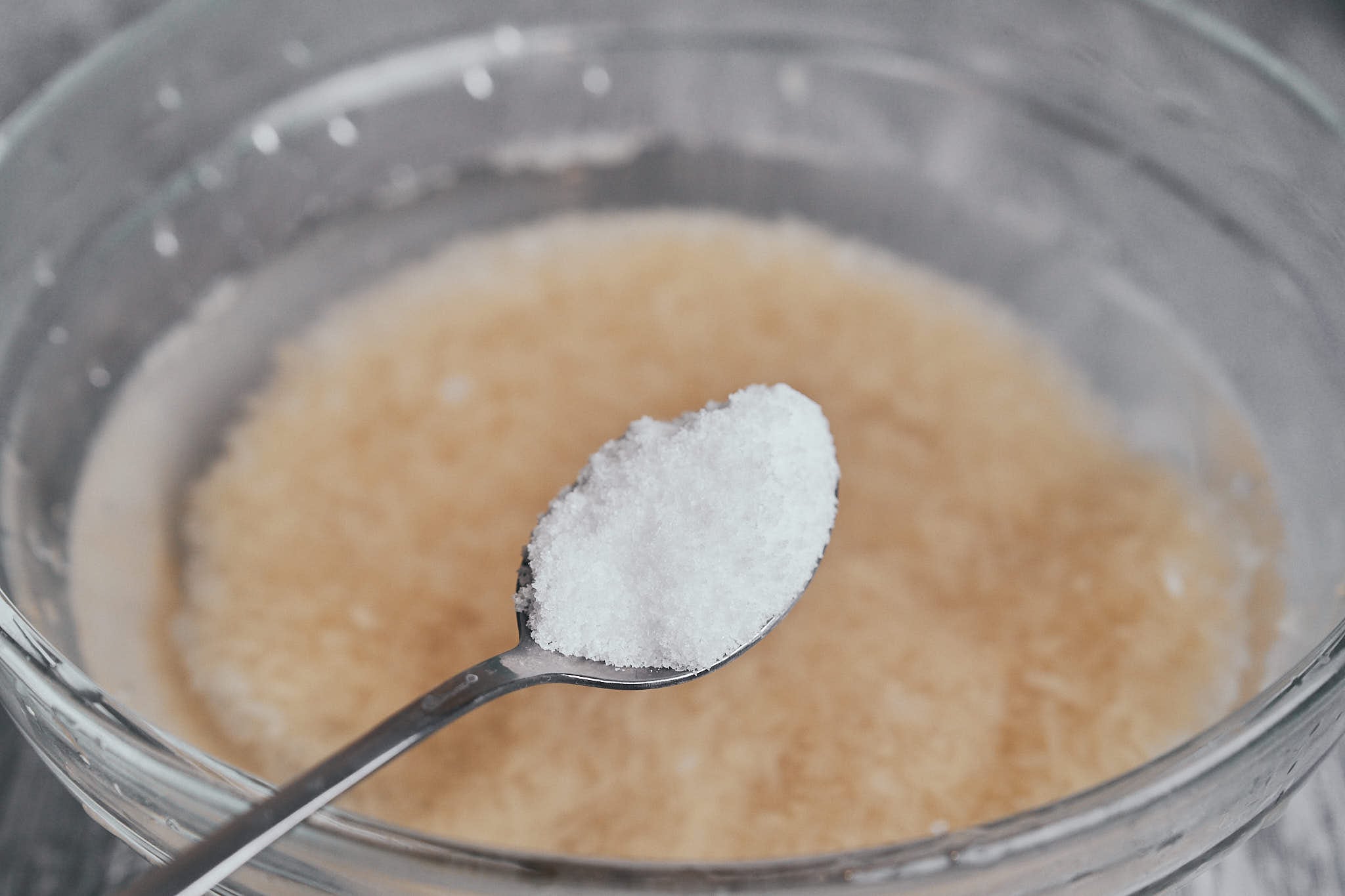 a spoonful of salt added to the soaking rice