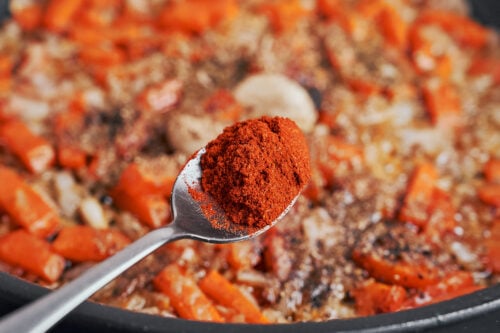 paprika being added for deeper color and flavor