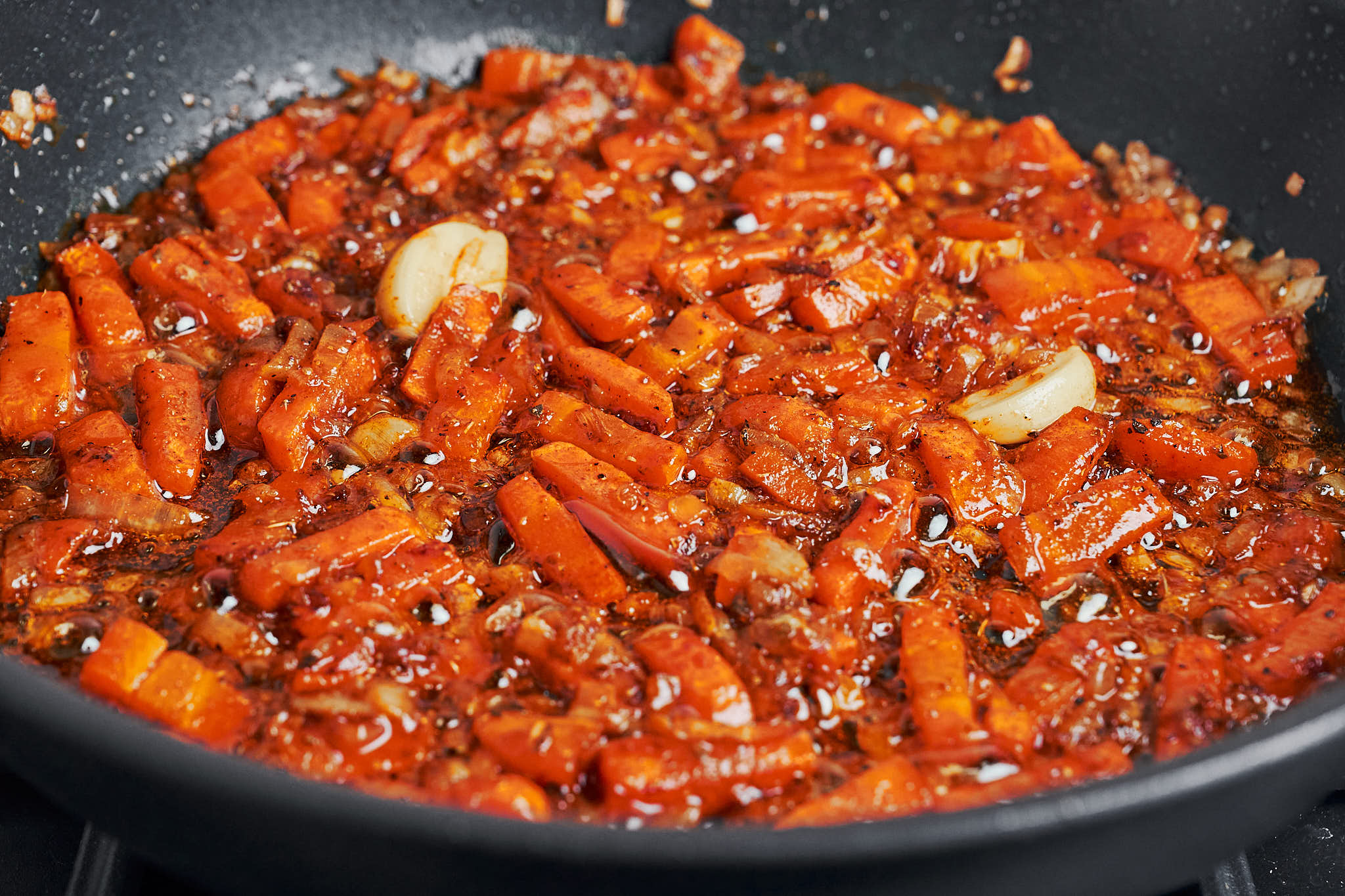 the vegetables cooked down with spices until glossy and fragrant