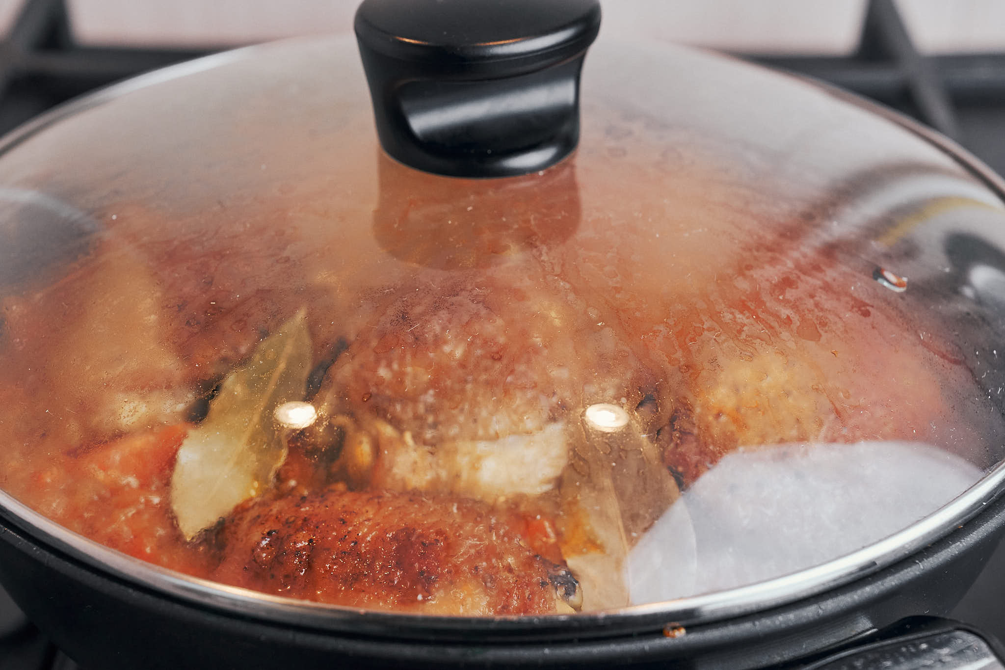 covering the skillet so the rice can finish nice and fluffy