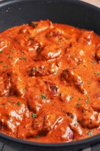 creamy paprika chicken in a rich velvety sauce for a cozy homemade dinner