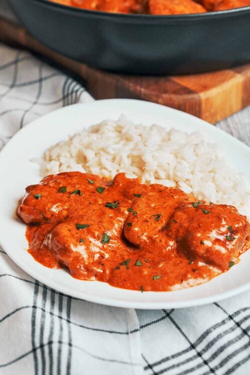creamy paprika chicken served over warm rice for a cozy dinner