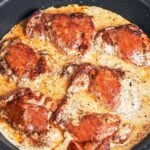 skillet creamy Dijon chicken thighs in a rich creamy sauce