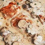 one-pan creamy mushroom chicken skillet with juicy chicken thighs and a rich mushroom cream sauce