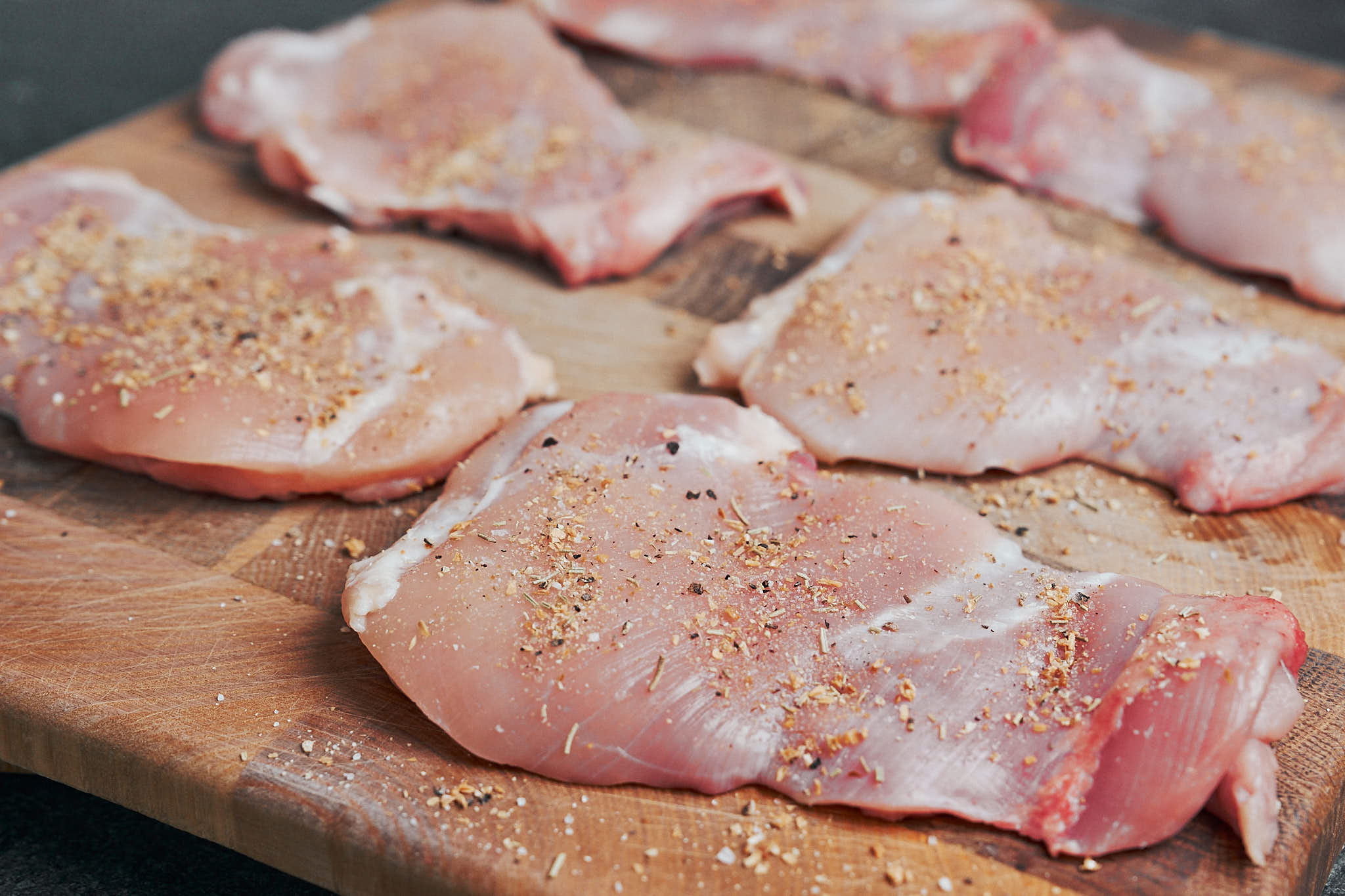 boneless chicken thighs seasoned with dry spice mixture before searing