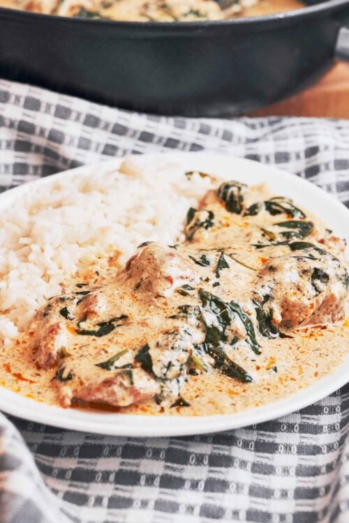 creamy spinach chicken served over rice for an easy dinner
