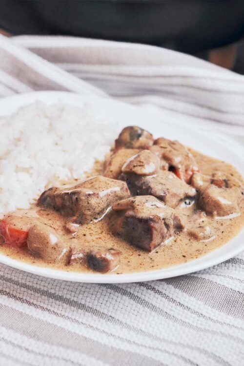 creamy beef stew served with rice for dinner