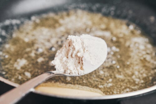 making a roux with butter and flour for the sauce