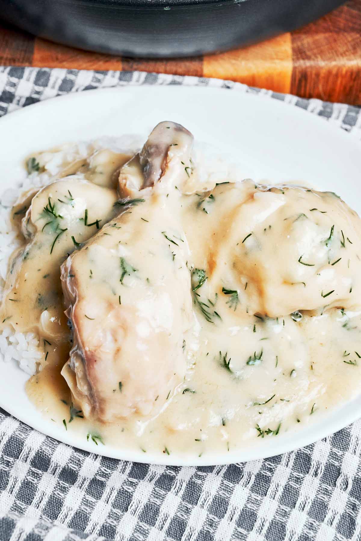 Cozy creamy chicken served over rice with silky sour cream sauce and fresh dill