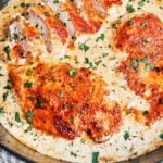 Creamy Alfredo Chicken with golden seared chicken breasts in a rich garlic Parmesan cream sauce.