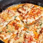Creamy chicken without cream in a skillet with silky garlic Parmesan sauce.