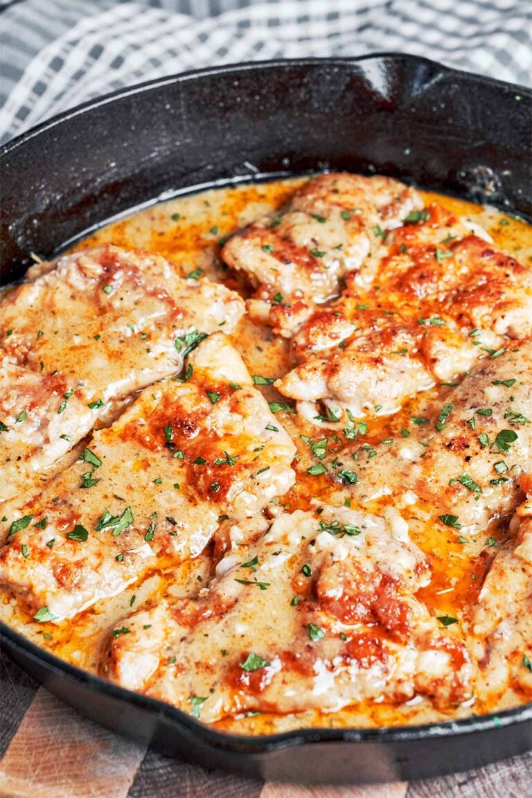 Creamy chicken without cream in a skillet with silky garlic Parmesan sauce.