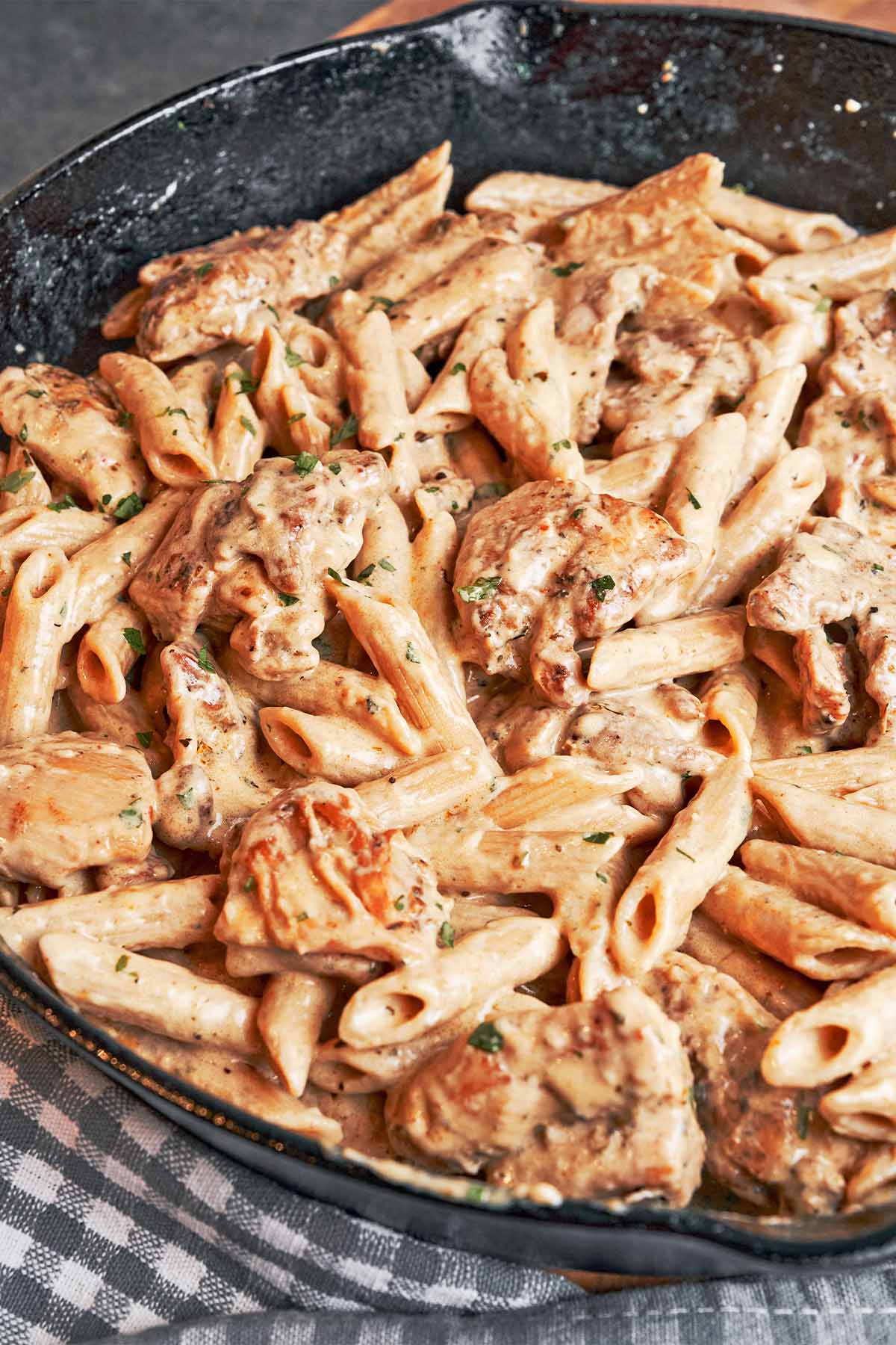 Creamy chicken pasta with juicy chicken pieces, penne, and a silky Parmesan sauce