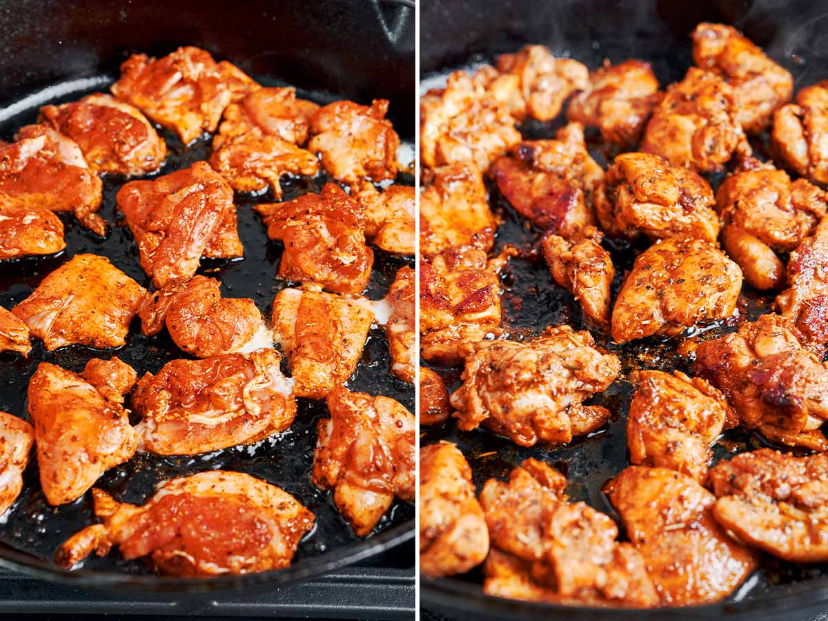 Bite-size seasoned chicken thighs searing in a hot skillet until golden.