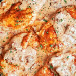Creamy Cajun chicken thighs in a rich Cajun cream sauce with sun-dried tomatoes
