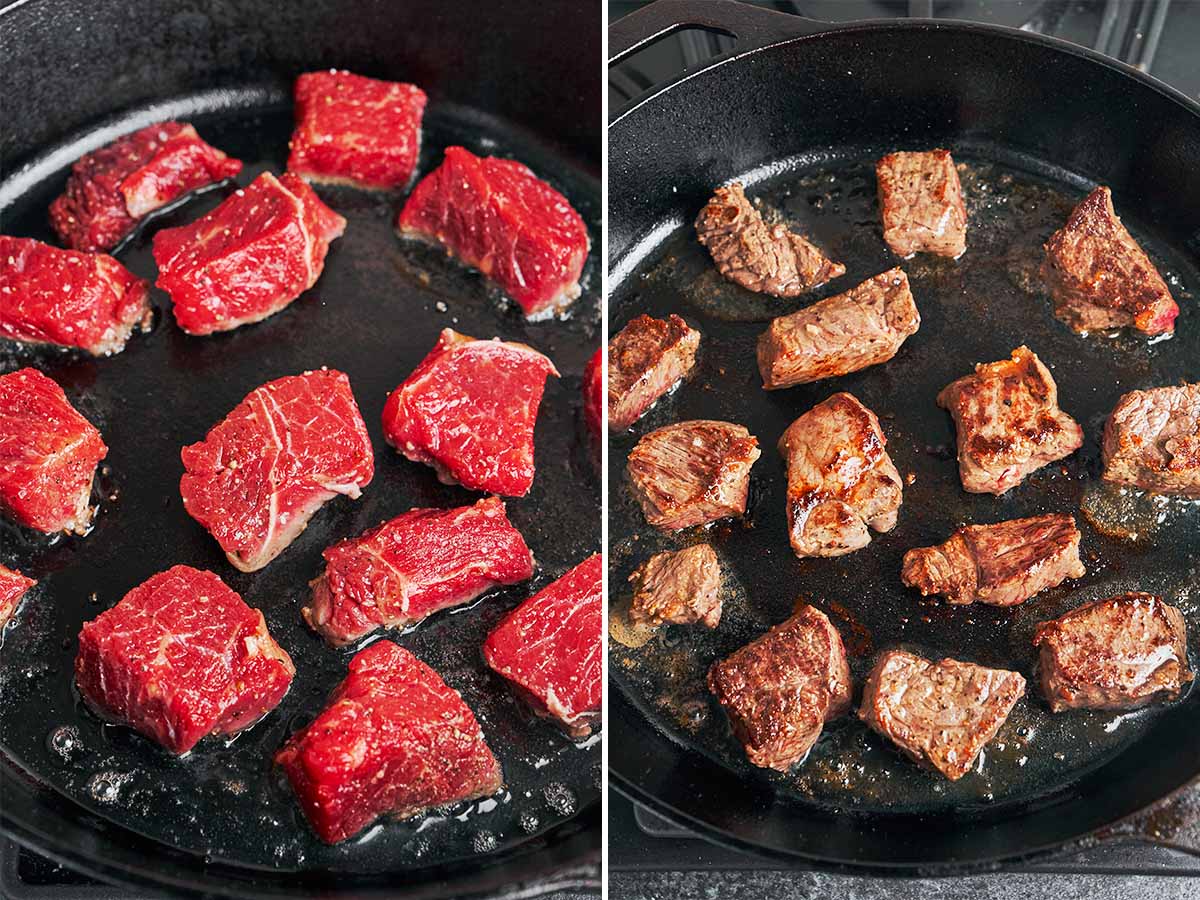 Beef pieces browning in a hot cast iron skillet until golden on the outside