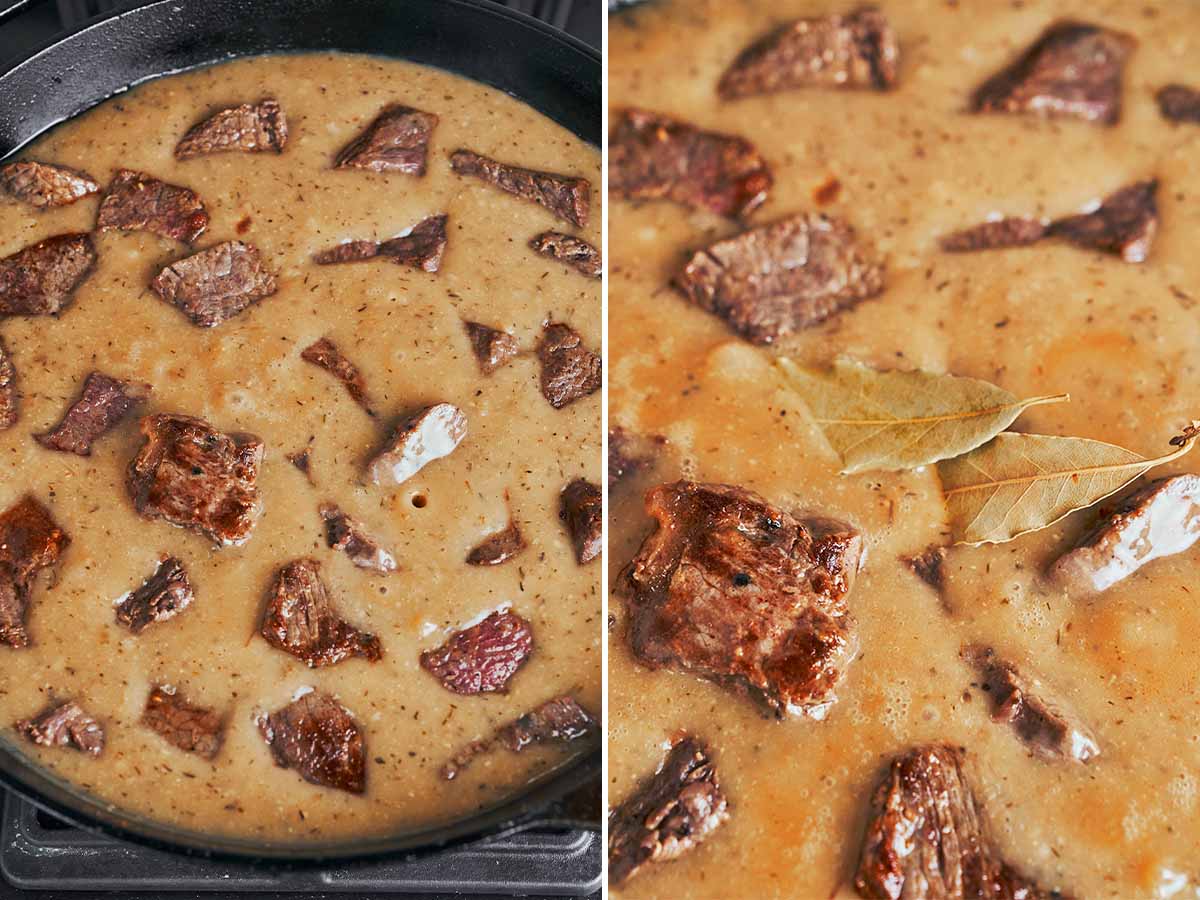 Browned beef simmering in a savory sauce with bay leaves until tender