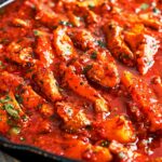 Pork Stew with Potatoes and Pickles with tender pork pieces and golden potato wedges simmered in a rich tomato-pickle sauce