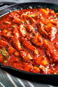 Pork Stew with Potatoes and Pickles with tender pork pieces and golden potato wedges simmered in a rich tomato-pickle sauce