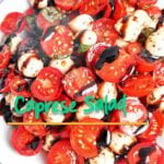 Easy Caprese Salad with cherry tomatoes, fresh mozzarella balls, basil, and balsamic glaze