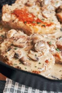 Creamy Pork Marsala with golden pork chops, tender mushrooms, and a rich Marsala cream sauce finished with fresh parsley.