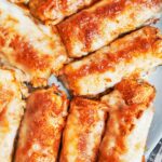 Crispy cheesy baked zucchini wedges with golden edges and melted mozzarella, ready to serve warm.