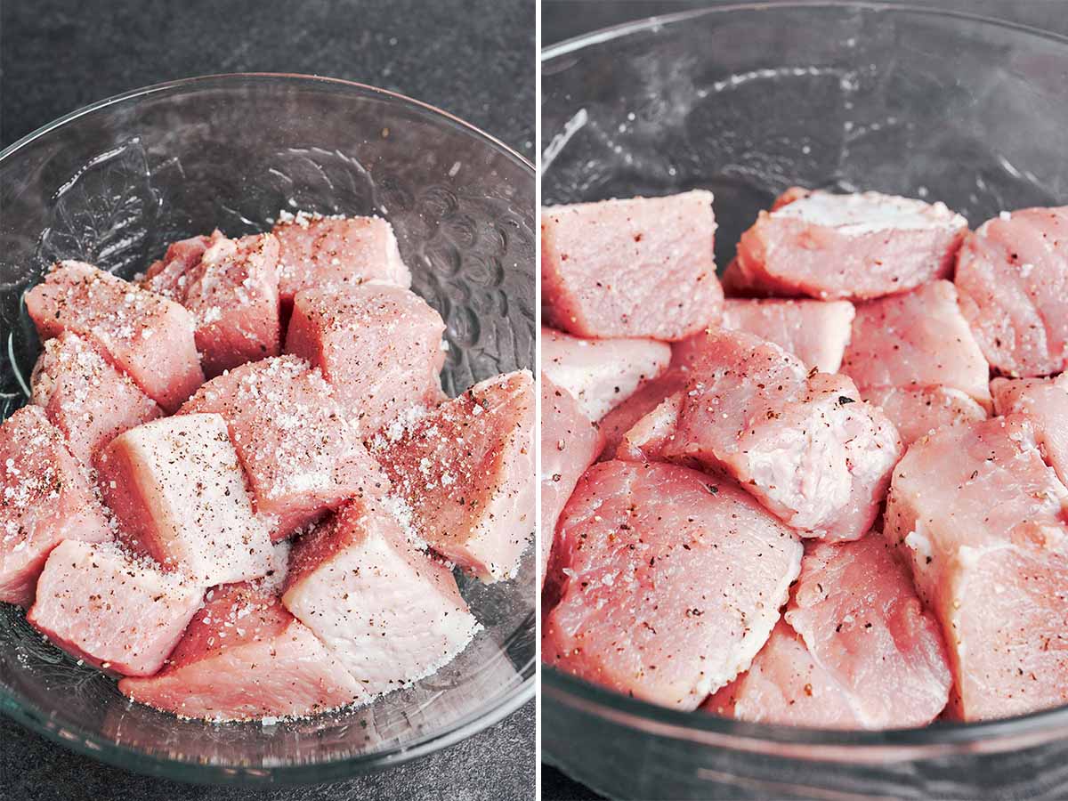 Large chunks of pork shoulder tossed with salt and black pepper, ready to be browned in the skillet.