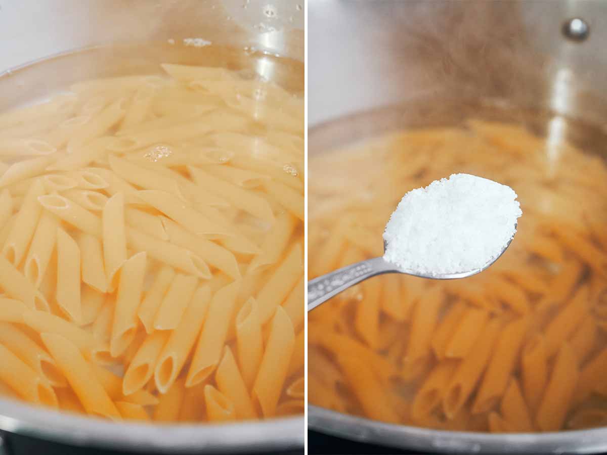 Penne cooking in gently bubbling water with a spoonful of salt added to season the pasta
