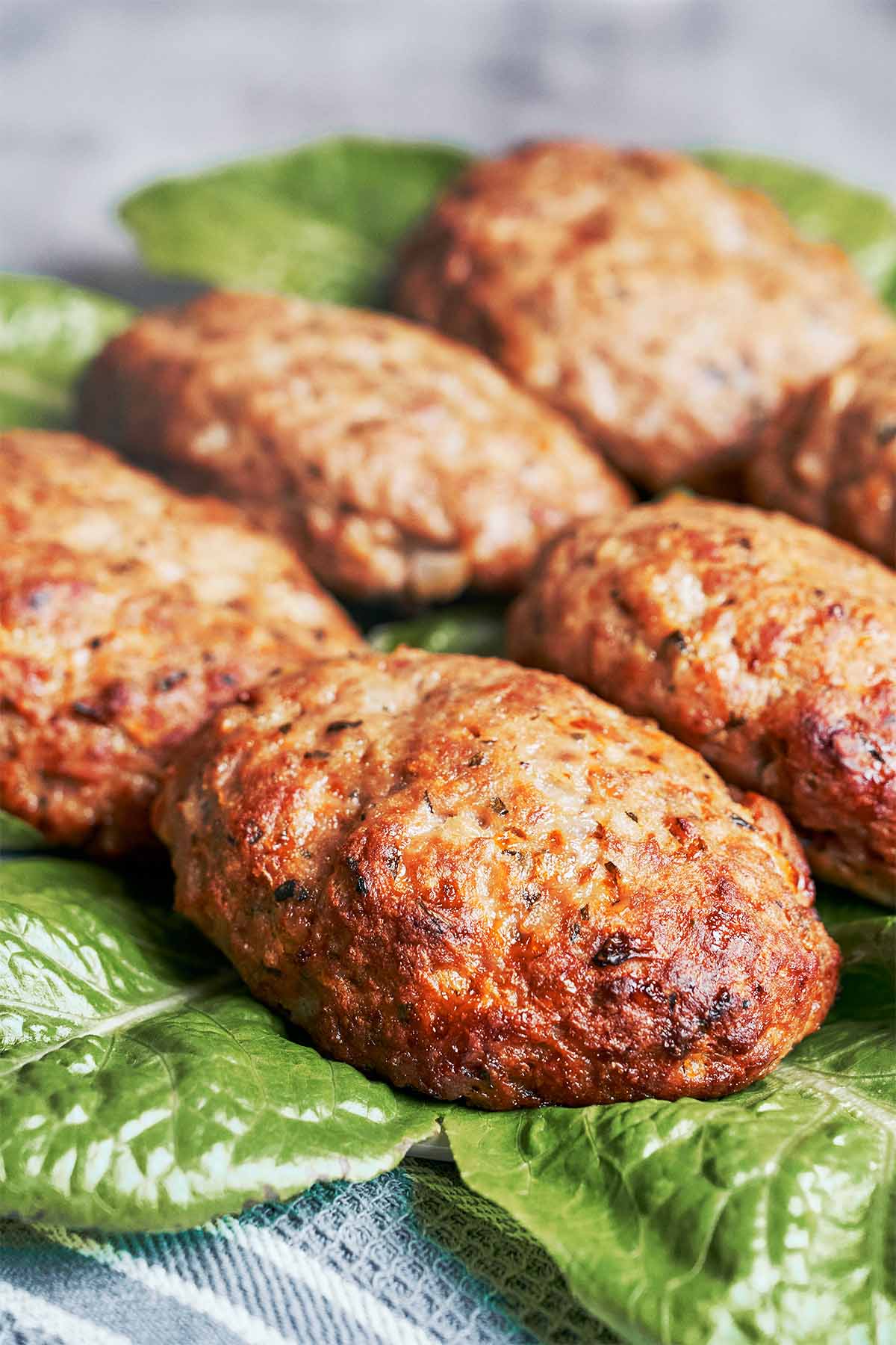 Golden baked beef patty with deeply browned edges and a juicy, tender center