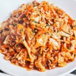 Ground Beef and Cabbage Skillet with tender cabbage, browned beef, carrots, and a rich savory tomato sauce.