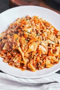 Ground Beef and Cabbage Skillet with tender cabbage, browned beef, carrots, and a rich savory tomato sauce.