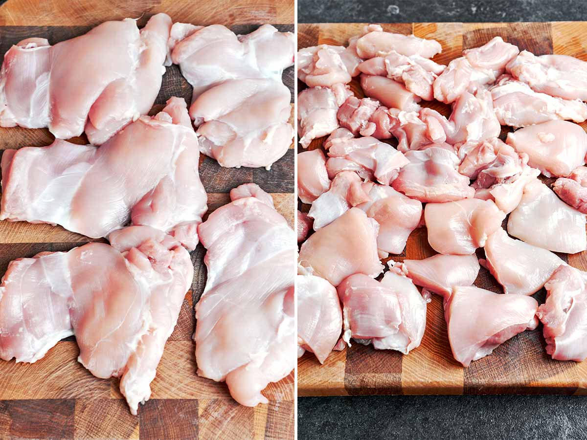 Boneless chicken thighs on a wooden board, cut into generous bite-size pieces and ready for seasoning.