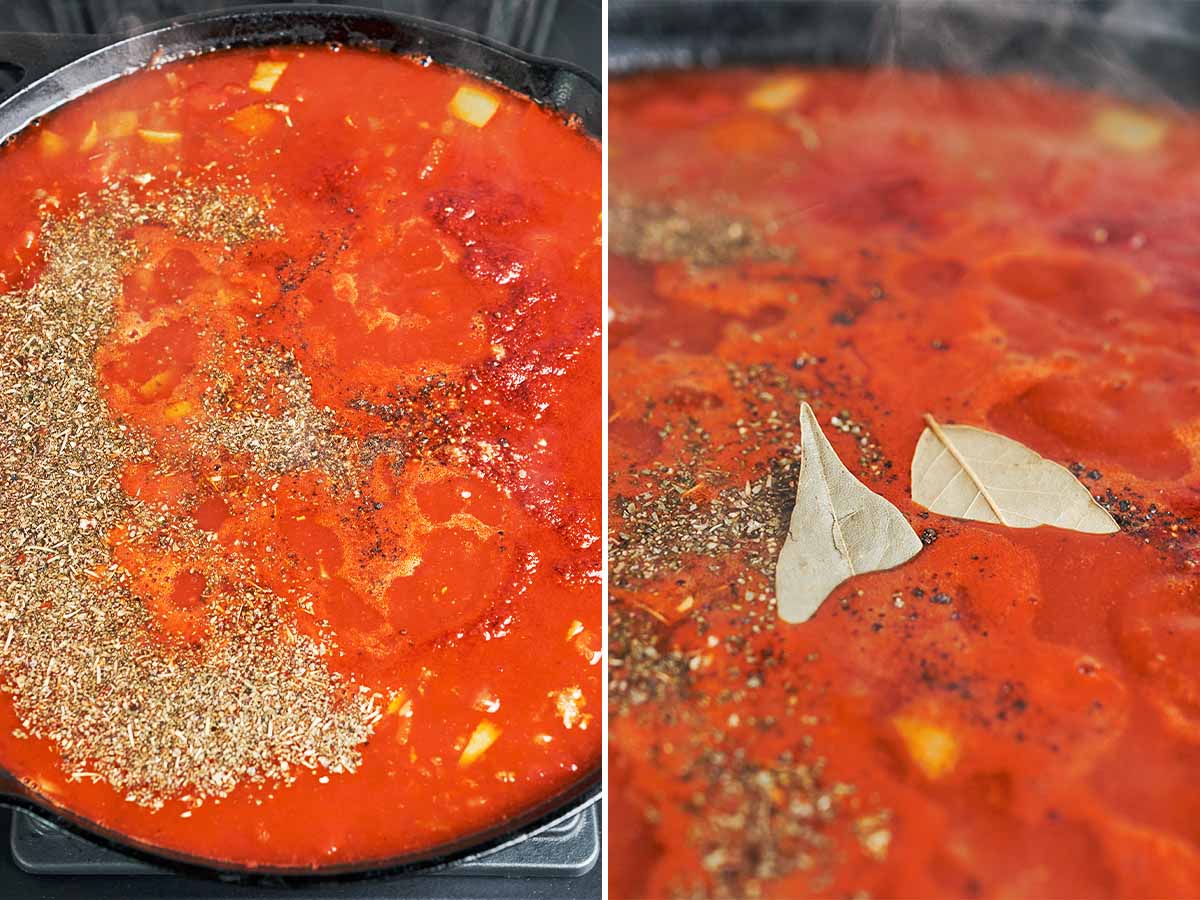Paprika, Italian seasoning, black pepper, and bay leaves scattered over the tomato sauce as it begins to simmer.