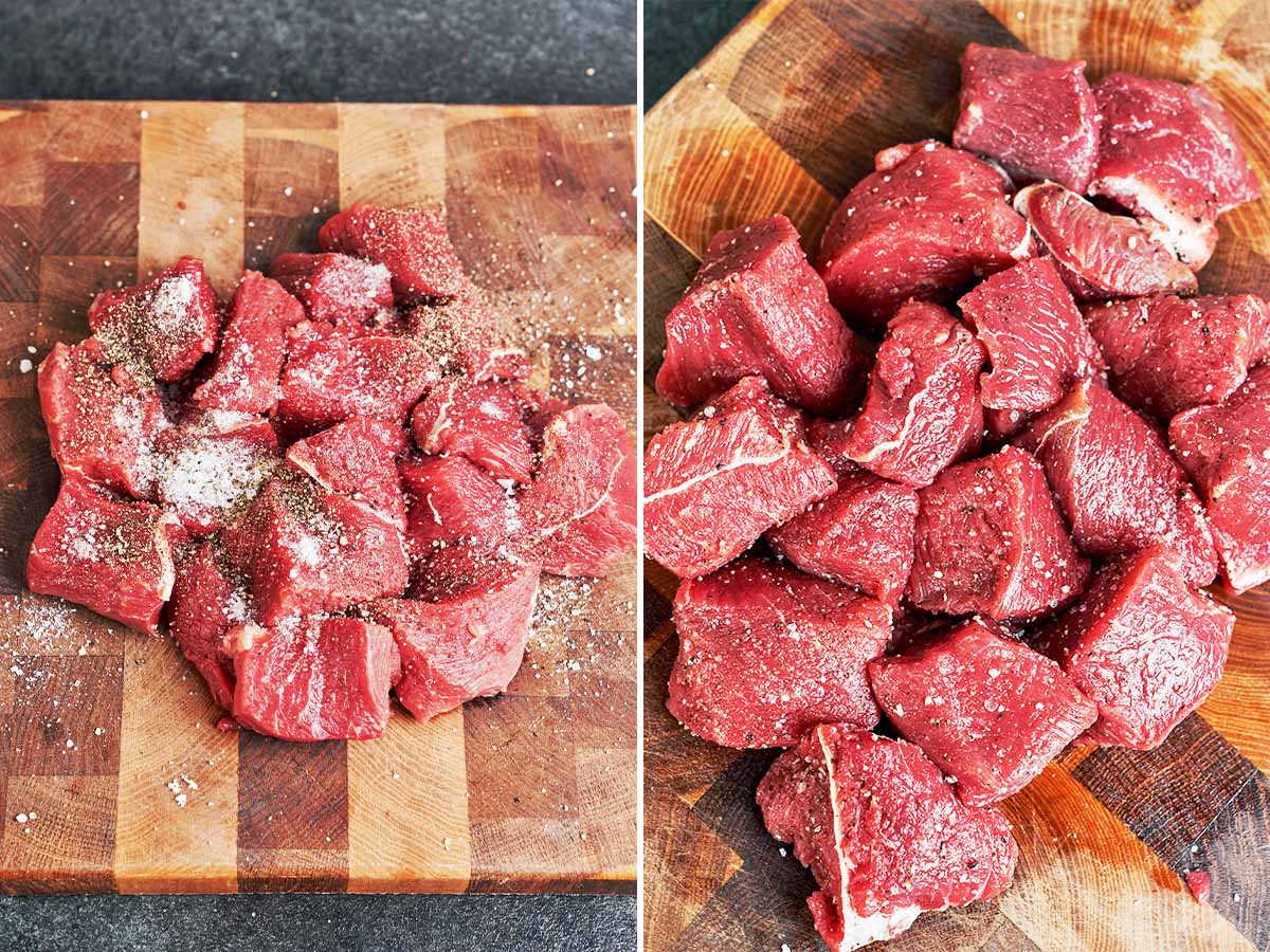 Seasoned beef cubes resting on a wooden board before they hit the hot skillet